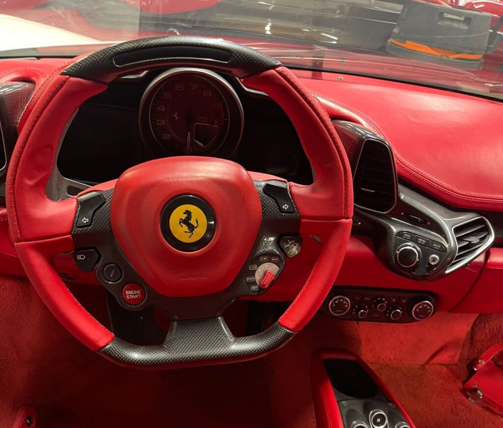 Ferrari 458 Italia dashboard with fully restored steering wheel by DSUS Auto Care in Dubai