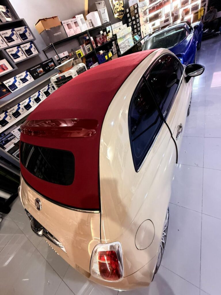 Completed maroon convertible roof on Fiat 500 at DSUS Al Quoz, finished and ready for the customer